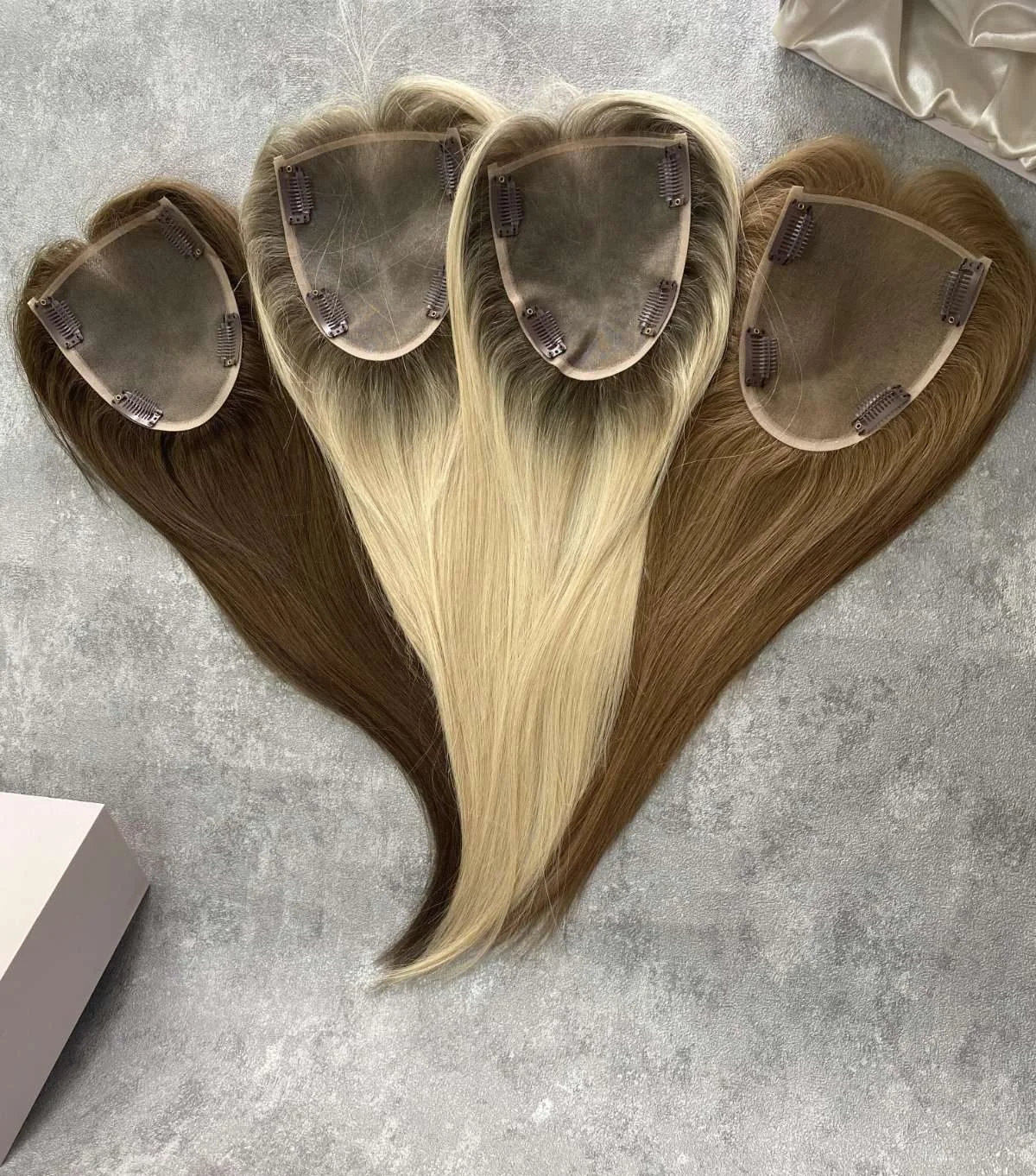 Hair toppers in multiple shades - blonde ombre, medium brown, caramel